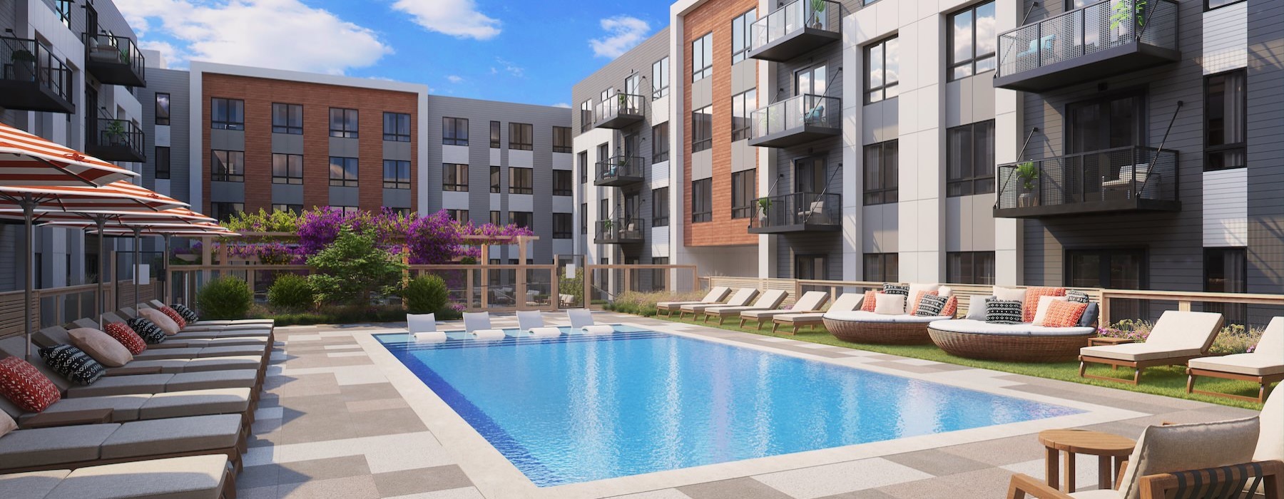 a swimming pool in a courtyard between buildings